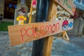 Pokemon go wooden sign in a street in George Town, Malaysia