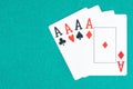 Poker aces cards on green gaming table Royalty Free Stock Photo