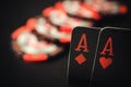 Poker Aces pair and stack of chips on the play table. Royalty Free Stock Photo