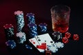 Poker cards with cubes are beautifully placed on the table, against the background of poker chips Royalty Free Stock Photo