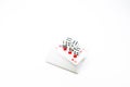 Poker cards and dices close up on white background Royalty Free Stock Photo