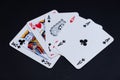 Poker Cards on desk with full house game on black background Royalty Free Stock Photo