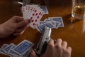Poker cards and handgun Royalty Free Stock Photo