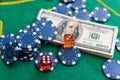 Poker cards royal flush, cash money dollar bills. Gambling, casino chips, dices. Casino tokens, gaming chips, checks, or Royalty Free Stock Photo