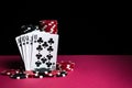 Poker cards with a royal flush combination. Close-up of playing cards and chips in casino. Free advertising space Royalty Free Stock Photo