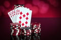 Poker cards with royal flush combination. Close-up of playing cards and chips in poker club. Free advertising space Royalty Free Stock Photo