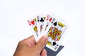 Poker cards on white backgrounds.Four kings in hand Royalty Free Stock Photo