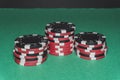Poker chips being display on a poker table. Concept poker image.