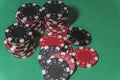 Poker chips being display on a poker table. Concept poker image.