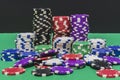 Poker chips being display on a poker table. Concept poker image.