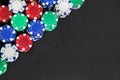 Poker chips on black background