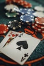 Poker chips and cards on a black background. Close-up Royalty Free Stock Photo