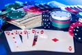 Poker chips, cards, dollars and bones Royalty Free Stock Photo