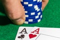 Poker chips and cards with two aces at the poker table Royalty Free Stock Photo