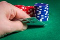 Poker chips and cards with two aces at the poker table Royalty Free Stock Photo