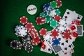 Poker Chips in casino gamble green table. Royalty Free Stock Photo