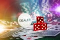 Poker Chips in casino gamble green table with len flare lighting Royalty Free Stock Photo