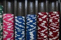 Poker chips colorful gaming pieces lie on the game table in the stack. Royalty Free Stock Photo