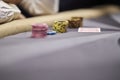 Poker chips colorful gaming pieces lie on the game table in the stack. Royalty Free Stock Photo