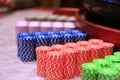 Poker chips colorful gaming pieces lie on the game table in the stack Royalty Free Stock Photo