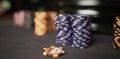 Poker chips colorful gaming pieces lie on the game table in the stack. Royalty Free Stock Photo