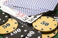 Poker chips and deck of cards closeup Royalty Free Stock Photo