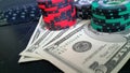 Poker chips and dollars