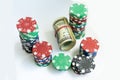 Poker chips, dollars on white background. Royalty Free Stock Photo