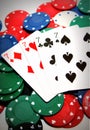 Poker chips and four sevens Royalty Free Stock Photo