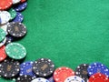 Poker chips on green felt table Royalty Free Stock Photo