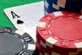 Poker chips pile and ace detail Royalty Free Stock Photo