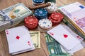 Poker chips, play card with dollar and euro Royalty Free Stock Photo