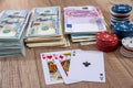 Poker chips, play card with dollar and euro Royalty Free Stock Photo