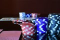 Poker Chips and playing cards on a gaming table. Royalty Free Stock Photo