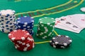 Poker chips with playing cards on table for blackjack. Casino and gambling