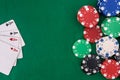 Poker chips with playing cards on table for blackjack. Casino and gambling