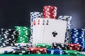 Poker chips with playing cards on table for blackjack. Casino and gambling