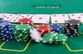 Poker chips with playing cards on table for blackjack. Casino and gambling