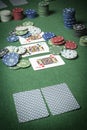 Poker chips stack on green table Royalty Free Stock Photo