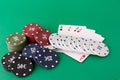 Poker cloth a deck of cards poker hand and chips. Background Royalty Free Stock Photo