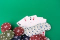 Poker cloth, a deck of cards, poker hand and chips. Background Royalty Free Stock Photo