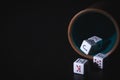 Poker cup with dice on a black background,poker game Royalty Free Stock Photo