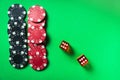 Poker dice with winning combination of eleven on green table and chips. Club atmosphere while playing Craps Royalty Free Stock Photo