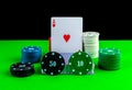 Poker game, deck of cards, ace card and stacks of chips on the table Royalty Free Stock Photo