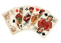 A poker hand of antique playing cards showing four jacks.