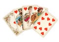 A poker hand of antique playing cards showing a royal flush of hearts. Royalty Free Stock Photo