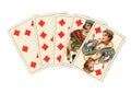 A poker hand of antique playing cards showing a straight flush of diamonds. Royalty Free Stock Photo