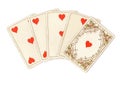 A poker hand of antique playing cards showing a straight flush of hearts. Royalty Free Stock Photo