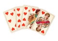 A poker hand of antique playing cards showing a straight flush of hearts. Royalty Free Stock Photo