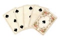 A poker hand of antique playing cards showing a straight flush of spades. Royalty Free Stock Photo